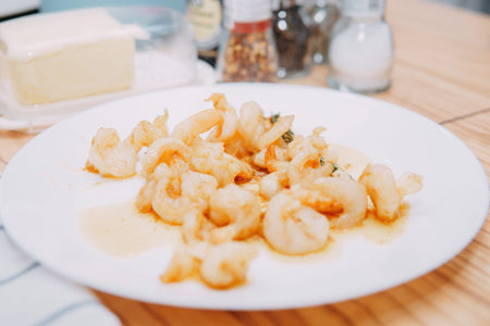 Preparing Sarsuella in a cooking mater class. Shrimp close-up. home-cooked food.