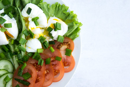 Breakfast on a keto diet. Poached egg with vegetables. Cooking at home. Homemade food. Diet food.の写真素材