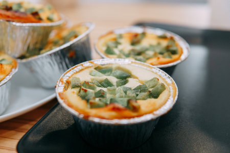 Sweet cupcakes with candied fruits close-up. We cook at homeの写真素材