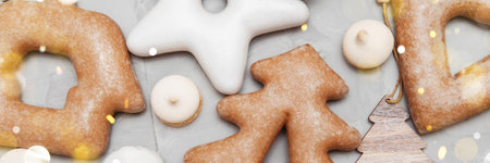 Banner for Christmas and New Year gingerbread stars, houses, Christmas trees, toys on a gray...