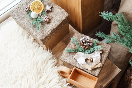 Brown craft box with a Christmas gift. Handmade gift. The concept of New Year and Christmas.の写真素材