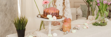 A set table for the celebration of Easter. Cakes and quail eggs on the Easter table.の写真素材