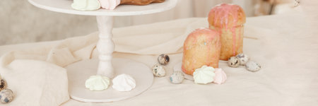 A set table for the celebration of Easter. Cakes and quail eggs on the Easter table.の写真素材