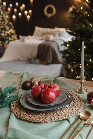 Serving a festive Christmas table in Scandinavian style. Decor on the table before the holiday.の写真素材