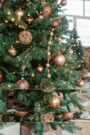 Bronze balls on the Christmas tree close-up. Christmas tree design decorations. The concept of celebrating New Year and Christmas.の写真素材