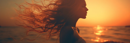 Double exposure. womans silhouette with stunning ocean sunset - tranquil beach sceneryの素材