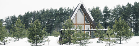 A country house in nature in winter. Rest in an ecologically clean place in winter. Glamping in natureの写真素材