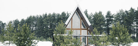A country house in nature in winter. Rest in an ecologically clean place in winter. Glamping in natureの写真素材