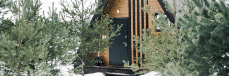 A country house in nature in winter. Rest in an ecologically clean place in winter. Glamping in natureの写真素材