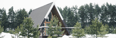 A country house in nature in winter. Rest in an ecologically clean place in winter. Glamping in natureの写真素材