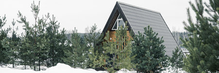 A country house in nature in winter. Rest in an ecologically clean place in winter. Glamping in natureの写真素材