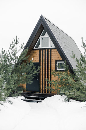A country house in nature in winter. Rest in an ecologically clean place in winter. Glamping in natureの写真素材