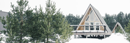 A country house in nature in winter. Rest in an ecologically clean place in winter. Glamping in natureの写真素材