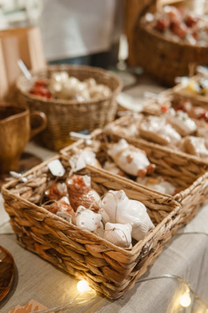 Sale of handmade ceramic Christmas tree toys at the Christmas Fair. Black Friday for the winter holidaysの写真素材