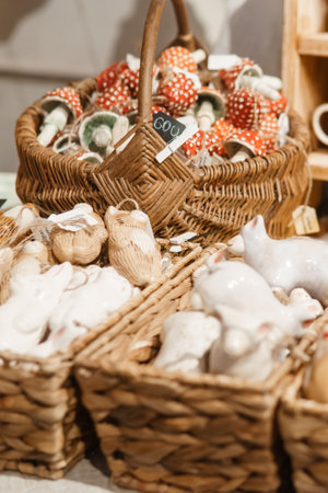 Sale of handmade ceramic Christmas tree toys at the Christmas Fair. Black Friday for the winter holidaysの写真素材