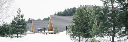 A country house in nature in winter. Rest in an ecologically clean place in winter. Glamping in natureの写真素材