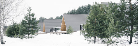 A country house in nature in winter. Rest in an ecologically clean place in winter. Glamping in natureの写真素材