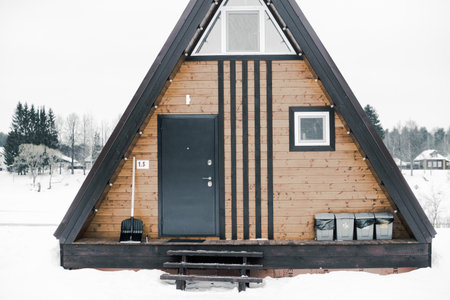 A country house in nature in winter. Rest in an ecologically clean place in winter. Glamping in natureの写真素材