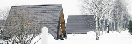 A country house in nature in winter. Rest in an ecologically clean place in winter. Glamping in natureの写真素材