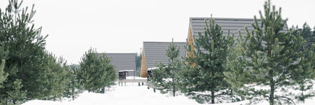 A country house in nature in winter. Rest in an ecologically clean place in winter. Glamping in natureの写真素材