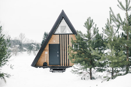 A country house in nature in winter. Rest in an ecologically clean place in winter. Glamping in natureの写真素材