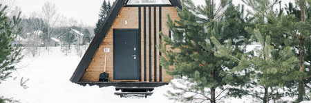 A country house in nature in winter. Rest in an ecologically clean place in winter. Glamping in natureの写真素材