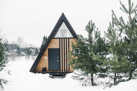 A country house in nature in winter. Rest in an ecologically clean place in winter. Glamping in natureの写真素材