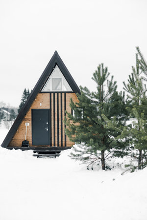 A country house in nature in winter. Rest in an ecologically clean place in winter. Glamping in natureの写真素材