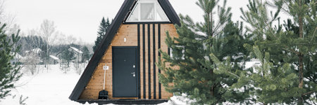 A country house in nature in winter. Rest in an ecologically clean place in winter. Glamping in natureの写真素材