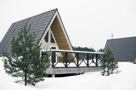 A country house in nature in winter. Rest in an ecologically clean place in winter. Glamping in natureの写真素材