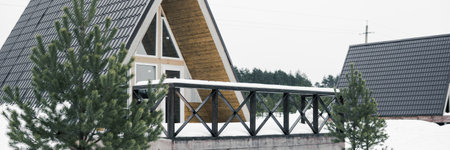 A country house in nature in winter. Rest in an ecologically clean place in winter. Glamping in natureの写真素材