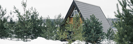 A country house in nature in winter. Rest in an ecologically clean place in winter. Glamping in natureの写真素材