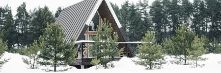 A country house in nature in winter. Rest in an ecologically clean place in winter. Glamping in natureの写真素材