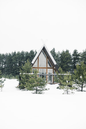 A country house in nature in winter. Rest in an ecologically clean place in winter. Glamping in nature.の写真素材
