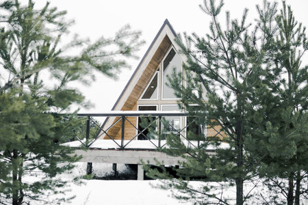 A country house in nature in winter. Rest in an ecologically clean place in winter. Glamping in nature.の写真素材