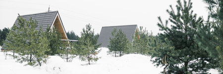 A country house in nature in winter. Rest in an ecologically clean place in winter. Glamping in nature.の写真素材