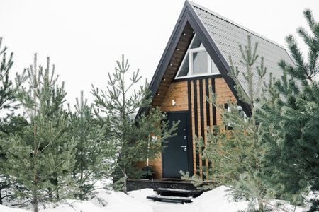 A country house in nature in winter. Rest in an ecologically clean place in winter. Glamping in nature.の写真素材