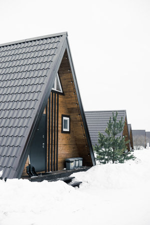 A country house in nature in winter. Rest in an ecologically clean place in winter. Glamping in nature.の写真素材