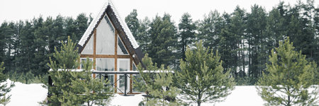 A country house in nature in winter. Rest in an ecologically clean place in winter. Glamping in nature.の写真素材