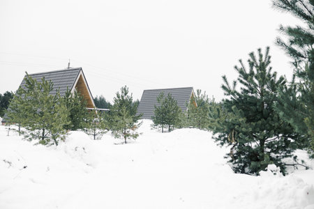 A country house in nature in winter. Rest in an ecologically clean place in winter. Glamping in nature.の写真素材