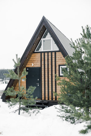A country house in nature in winter. Rest in an ecologically clean place in winter. Glamping in nature.の写真素材