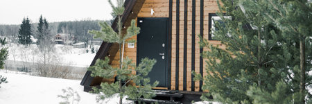 A country house in nature in winter. Rest in an ecologically clean place in winter. Glamping in nature.の写真素材