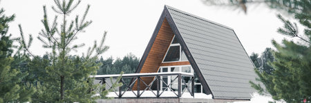 A country house in nature in winter. Rest in an ecologically clean place in winter. Glamping in nature.の写真素材