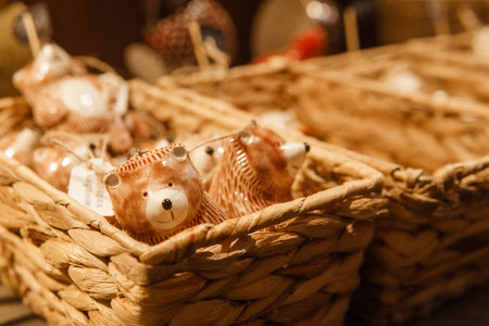 Sale of handmade ceramic Christmas tree toys at the Christmas Fair. Black Friday for the winter holidaysの写真素材