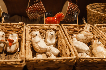 Sale of handmade ceramic Christmas tree toys at the Christmas Fair. Black Friday for the winter holidaysの写真素材