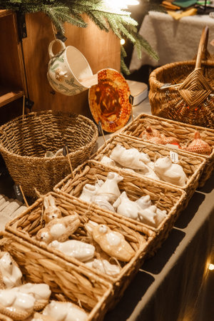 Sale of handmade ceramic Christmas tree toys at the Christmas Fair. Black Friday for the winter holidaysの写真素材