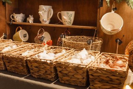 Sale of handmade ceramic Christmas tree toys at the Christmas Fair. Black Friday for the winter holidaysの写真素材