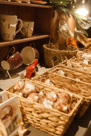 Sale of handmade ceramic Christmas tree toys at the Christmas Fair. Black Friday for the winter holidaysの写真素材