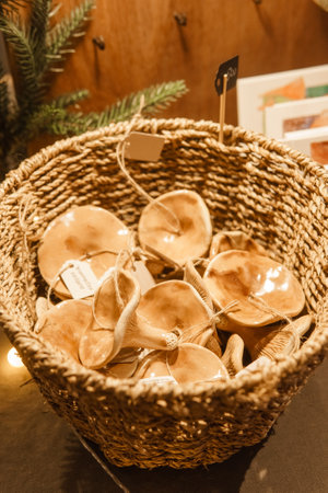 Sale of handmade ceramic Christmas tree toys at the Christmas Fair. Black Friday for the winter holidays.の写真素材