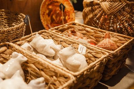 Sale of handmade ceramic Christmas tree toys at the Christmas Fair. Black Friday for the winter holidaysの写真素材